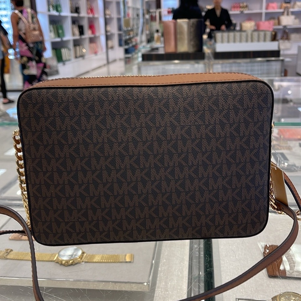 MICHAEL KORS
Jet Set Large East West Zip Printed Logo Crossbody Bag
Brown 
NWT - Picture 11 of 16